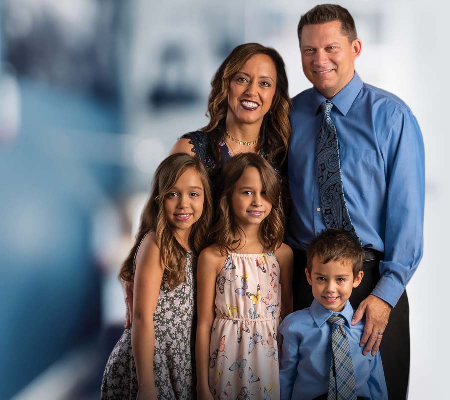 Dr. Connell, her husband, and their three kids